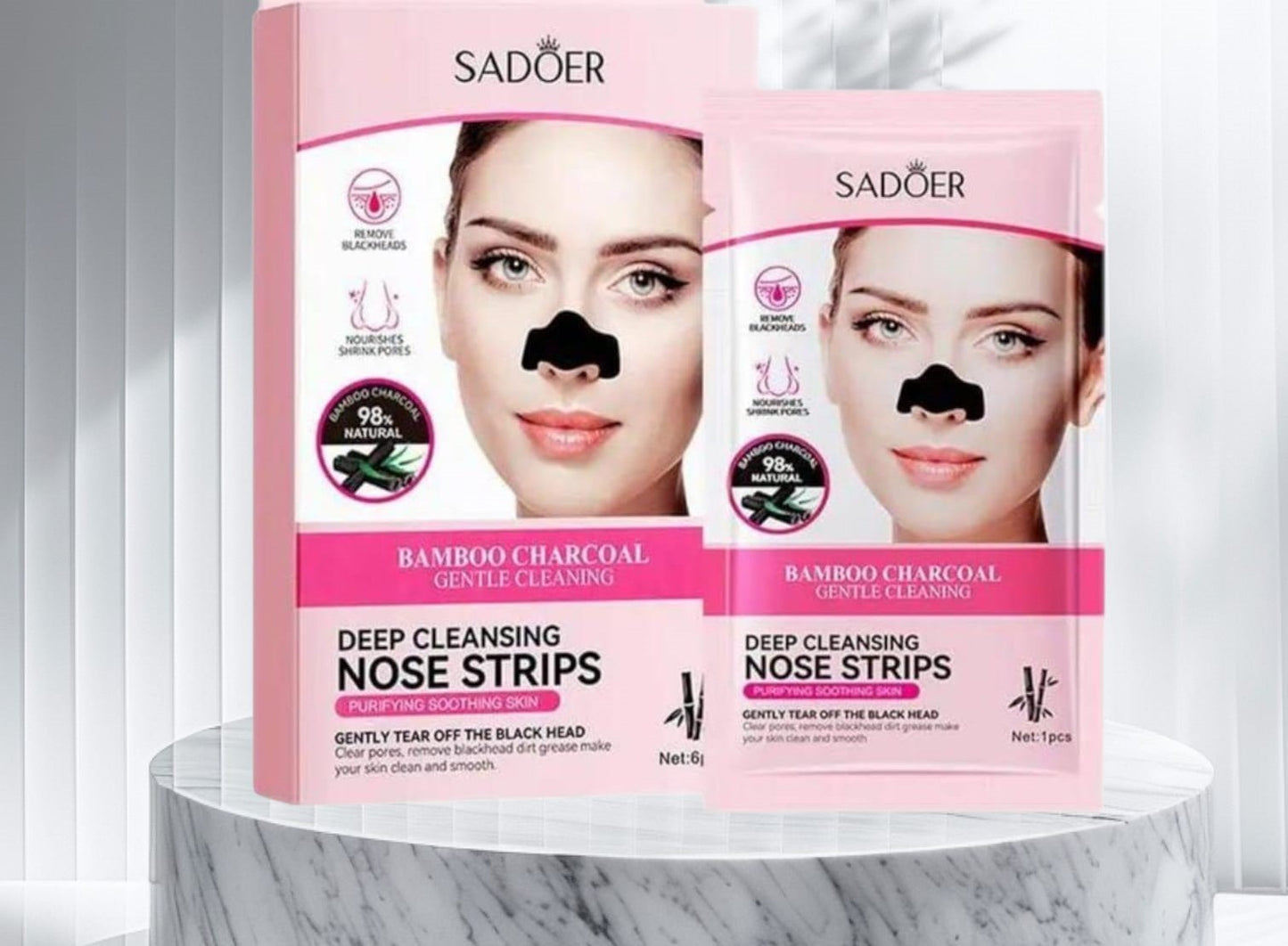 SADOER Charcoal Deep Cleansing Nose Strips product packaging front view
Model peeling off charcoal nose strip from nose
Used charcoal pore strip showing removed blackheads
How to use SADOER charcoal nose strips infographic
Lifestyle flat-lay of SADOER nose strips with skincare items