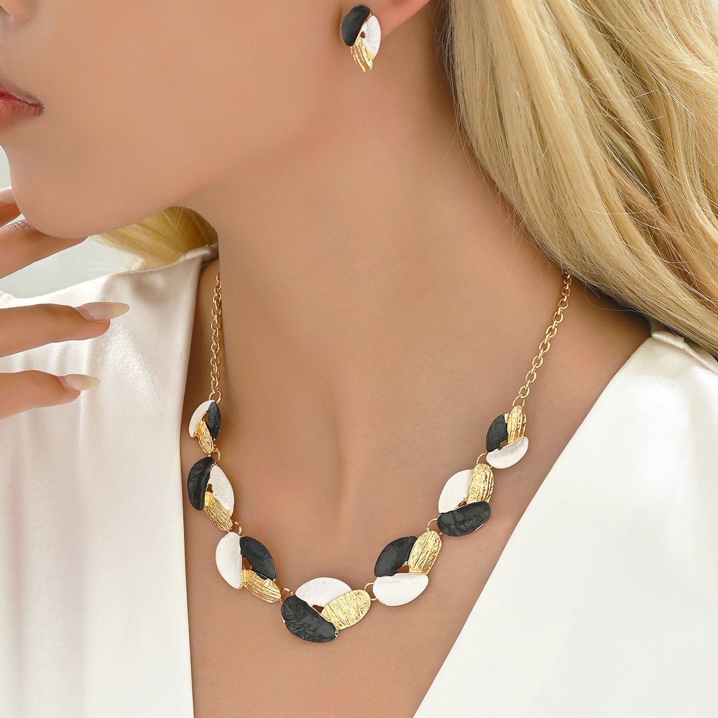 Celebrity Collection: Elegant Three-Tone Leaf Necklace and Earring Set"