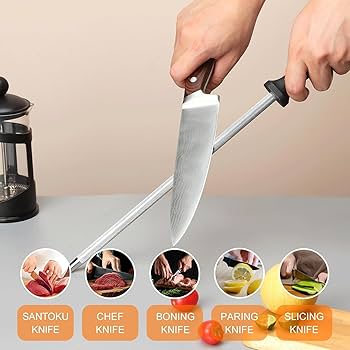 Stainless steel kitchen knife set with sharpening rod and black handle.