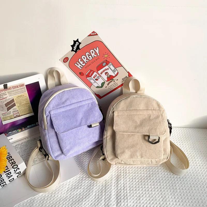 Ladies fashion canvas small square backpack random colours.