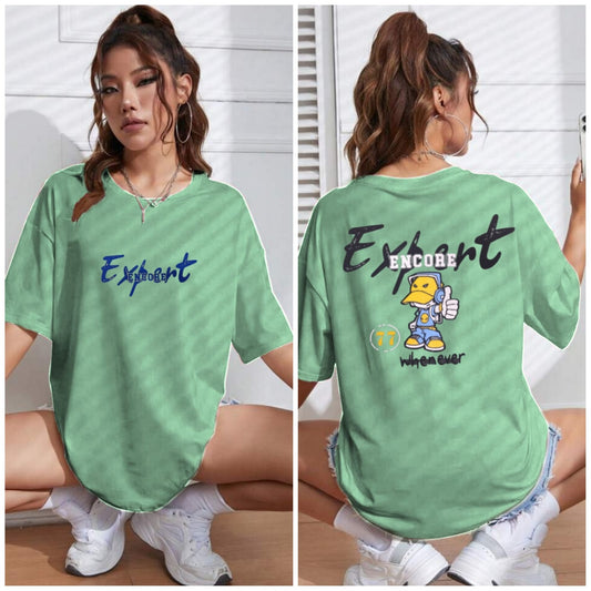 Back view of woman wearing oversized lavender “Expert Encore” cartoon t-shirt
