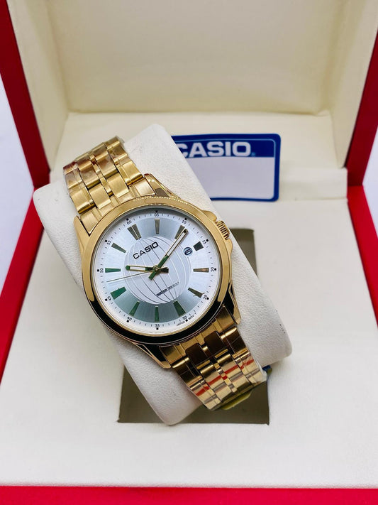 Casio men’s gold-tone watch with silver dial and date window
