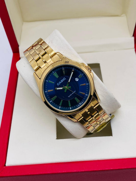 Casio gold-tone men’s watch with deep blue dial and stainless steel strap

