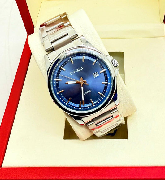 Casio men’s watch with silver strap and blue dial