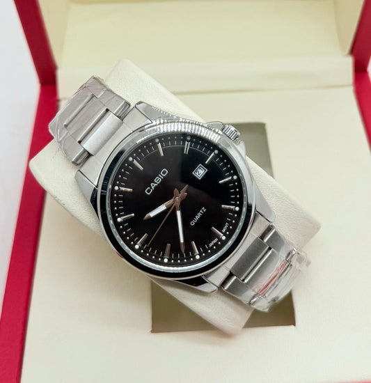 Casio men’s wristwatch with black dial and stainless steel strap
