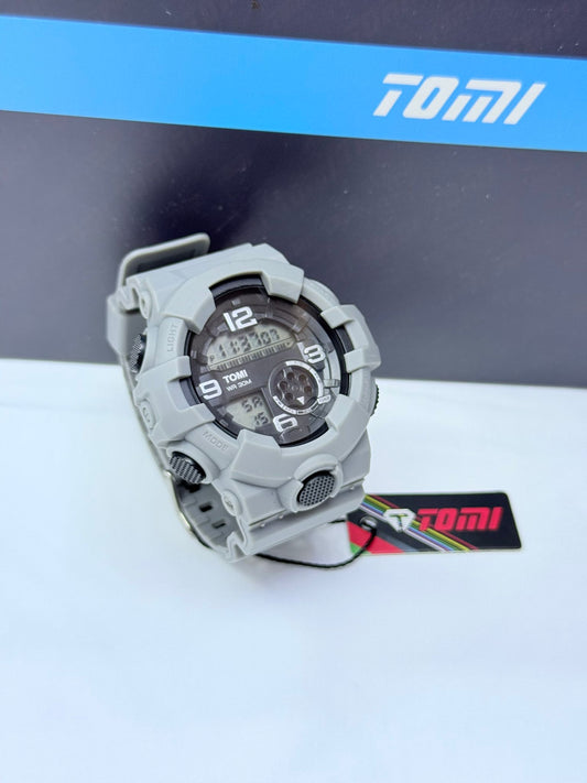 Grey Tomi digital analog sports wristwatch with rugged design.