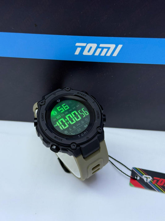 Tomi full digital sports watch with black case, beige strap, and green LED display.
