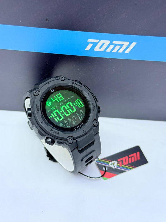 Black Tomi full digital sports wristwatch with green LED display.